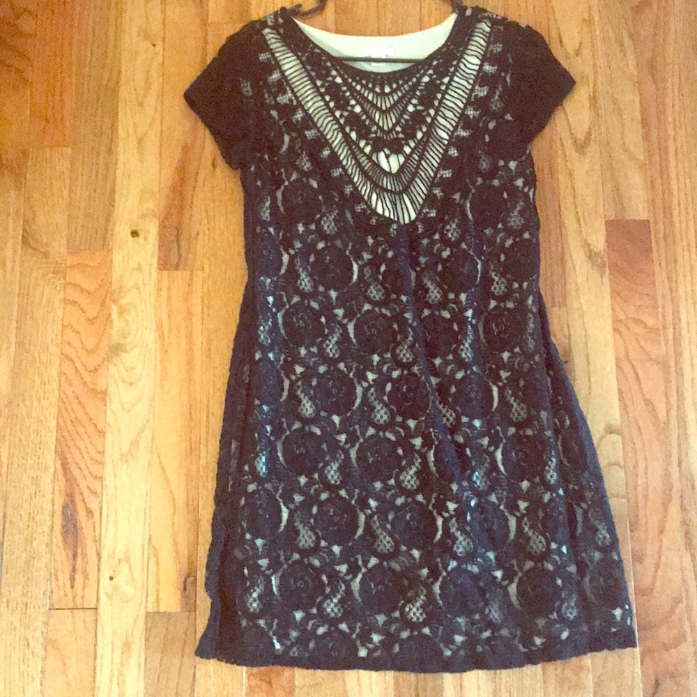 Black lace mini dress with cream underlay
